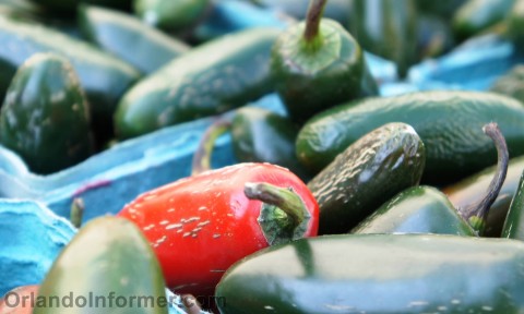 Celebration farmers market: Lots of green and one red. Celebration farmers market: Lots of green and one red.