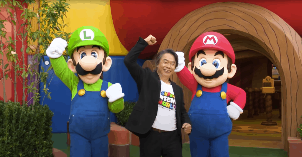 Shigeru Miyamoto with Mario and Luigi at Super Nintendo World